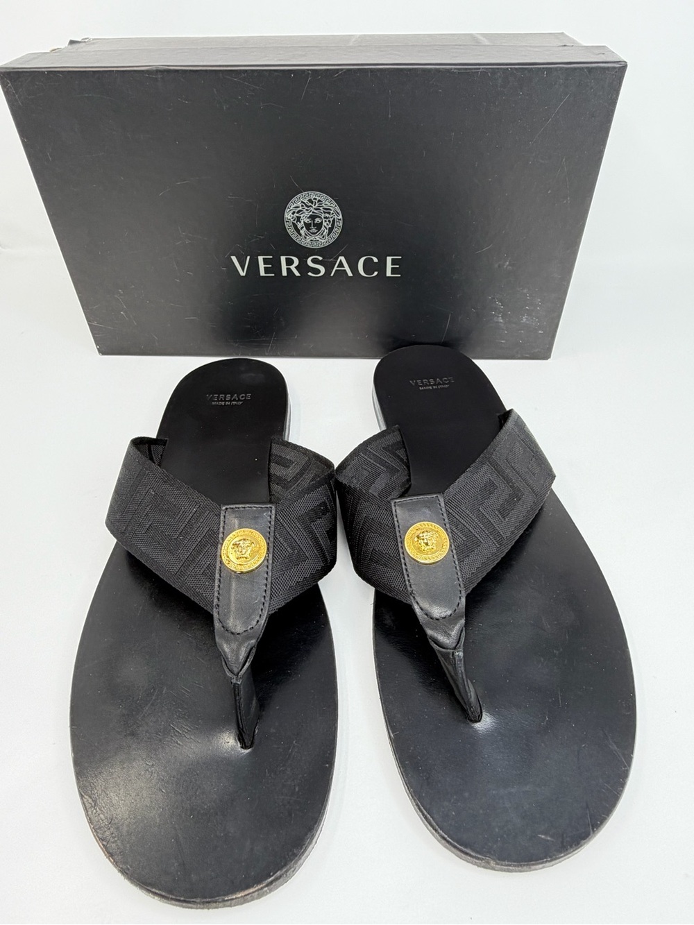 Versace Black Thong Sandals with Gold Medusa Accent